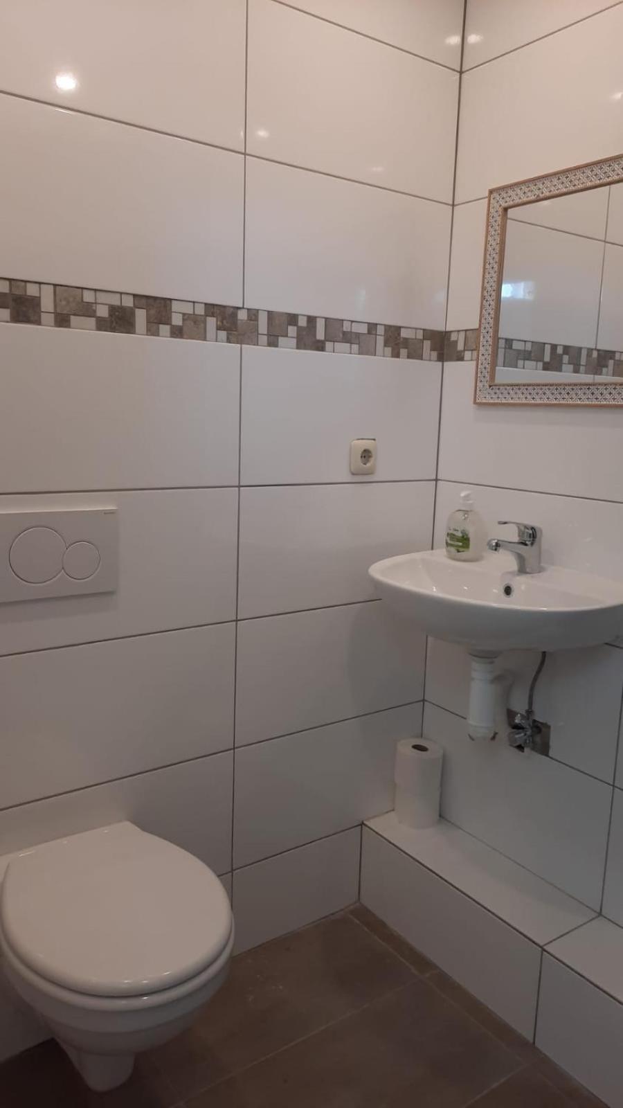 Ferienwohnung Mittelpunkt Schortens Esterno foto